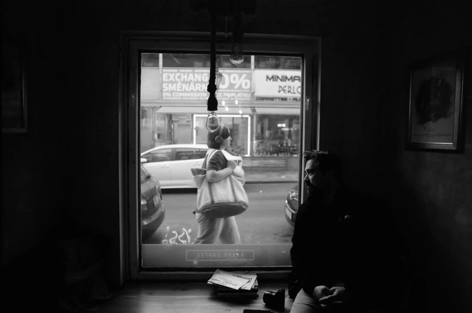 A framed street scene in Prague shot on Fujifilm Neopan Acros black and white film