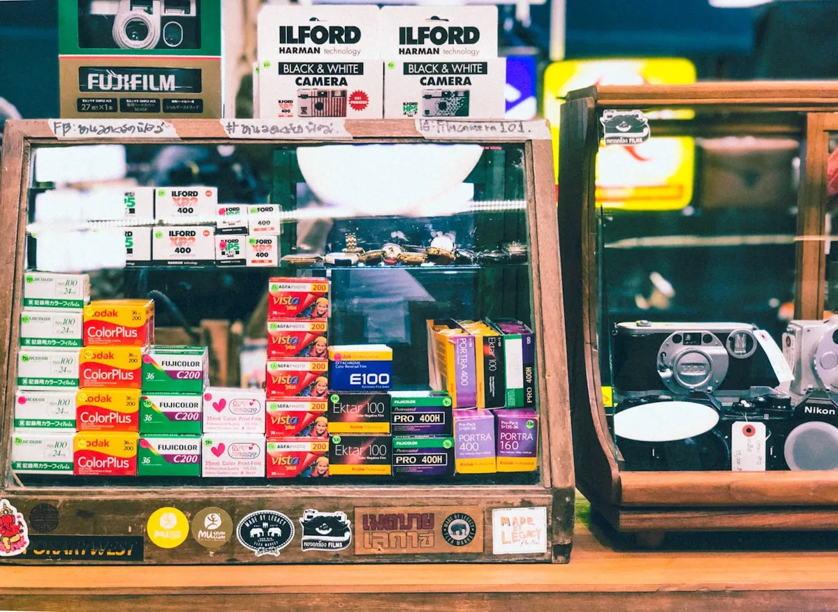 Camera store shelf displaying film stocks from various brands