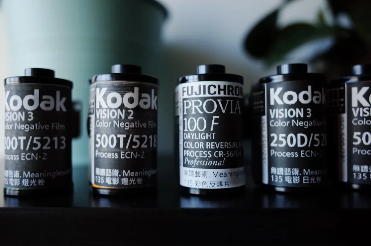 Collection of 35mm film canisters and rolls
