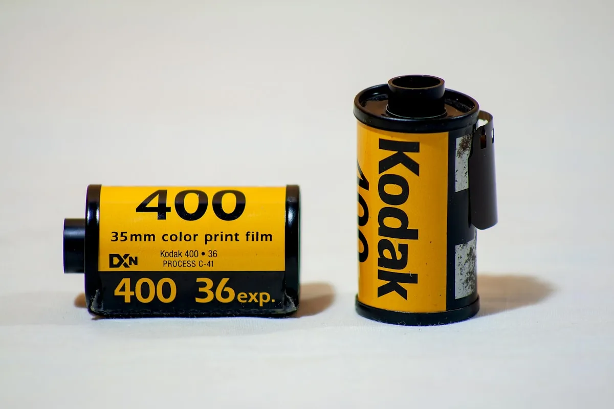 Two rolls of Kodak 35mm film canisters