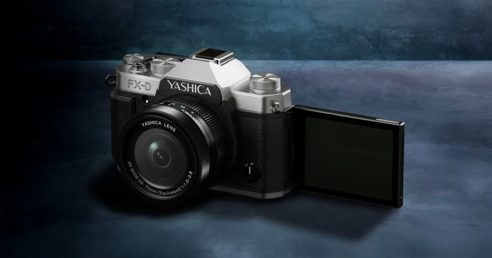 Silver-and-black Yashica FX-D digital camera styled like a vintage 35mm SLR, with its 3x zoom lens and flip-out rear screen extended